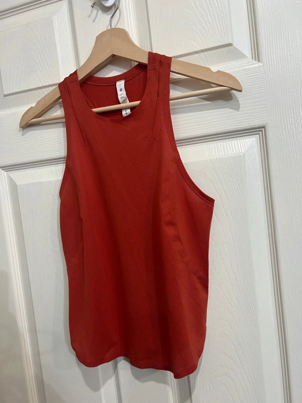 23. Lululemon size 2 fast and free running training tank burnt orange